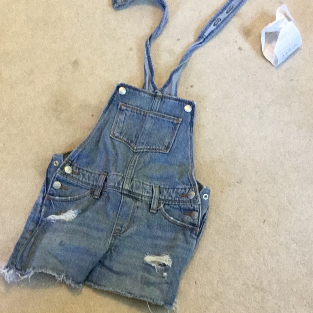 Denim overalls (shortalls) with rips
